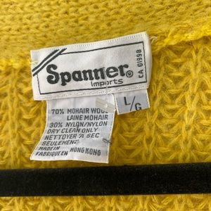 Vintage wool cardigan sweater. Slightly oversized for small or medium sizes.